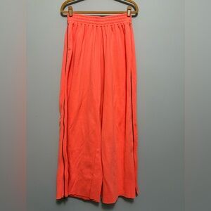 Urban Outfitters Vibrant Orange wide Legged Pants with full zippers on the sides